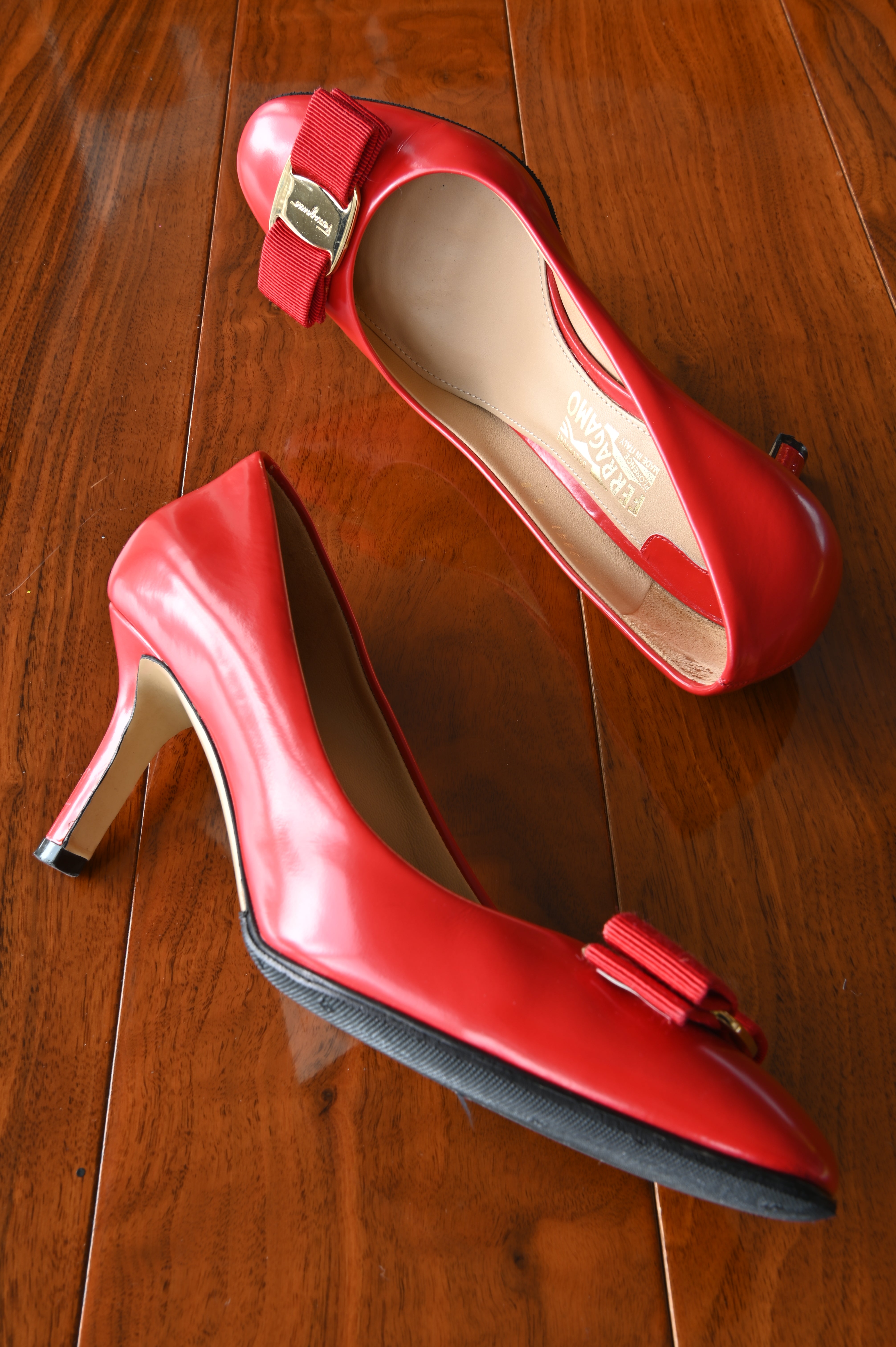 Top view of authentic Salvatore Ferragamo Vara pumps showcasing the leather-lined interior and signature grosgrain bow.