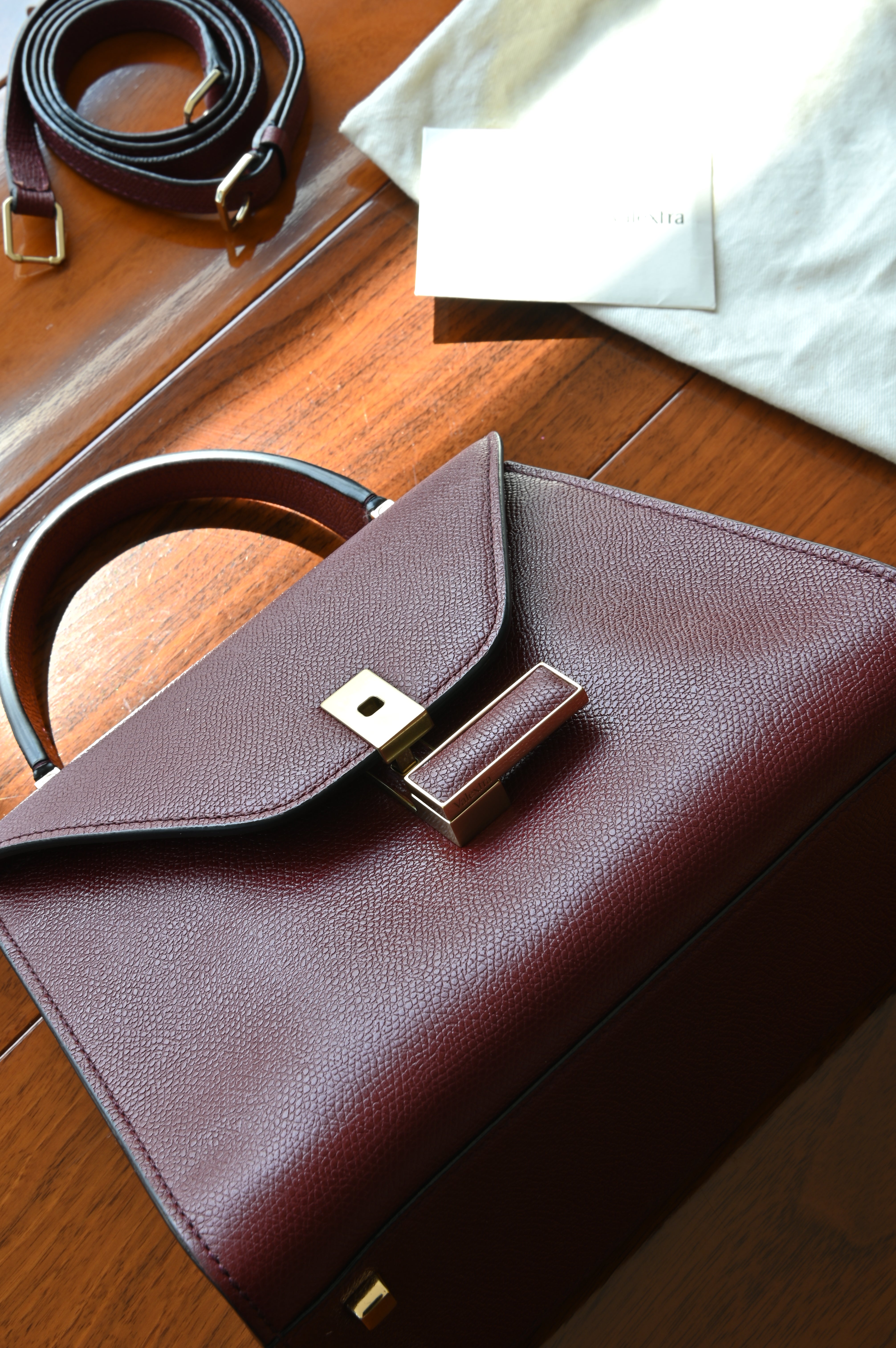 Authentic Valextra Iside handbag with its detachable shoulder strap, original dust bag, and original card included.